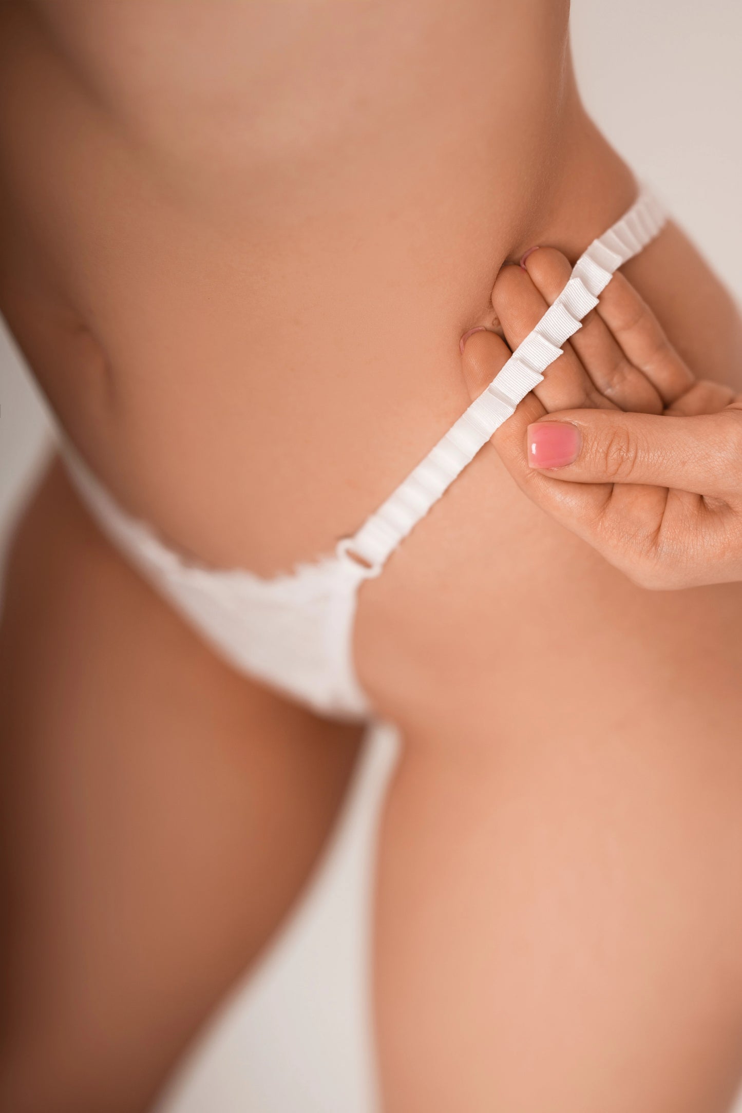 Delicate polka dot lace thong